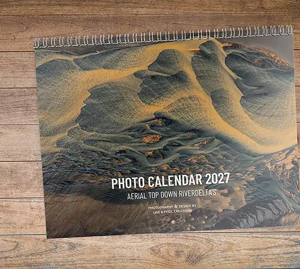 Front cover of the Aerial Top Down River Deltas 2027 photo wall calendar featuring an original aerial photograph of Iceland’s braided river patterns.